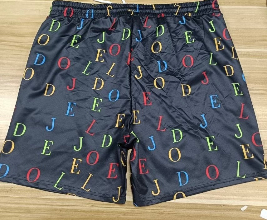 LETTER LUX SWIM SHORTS